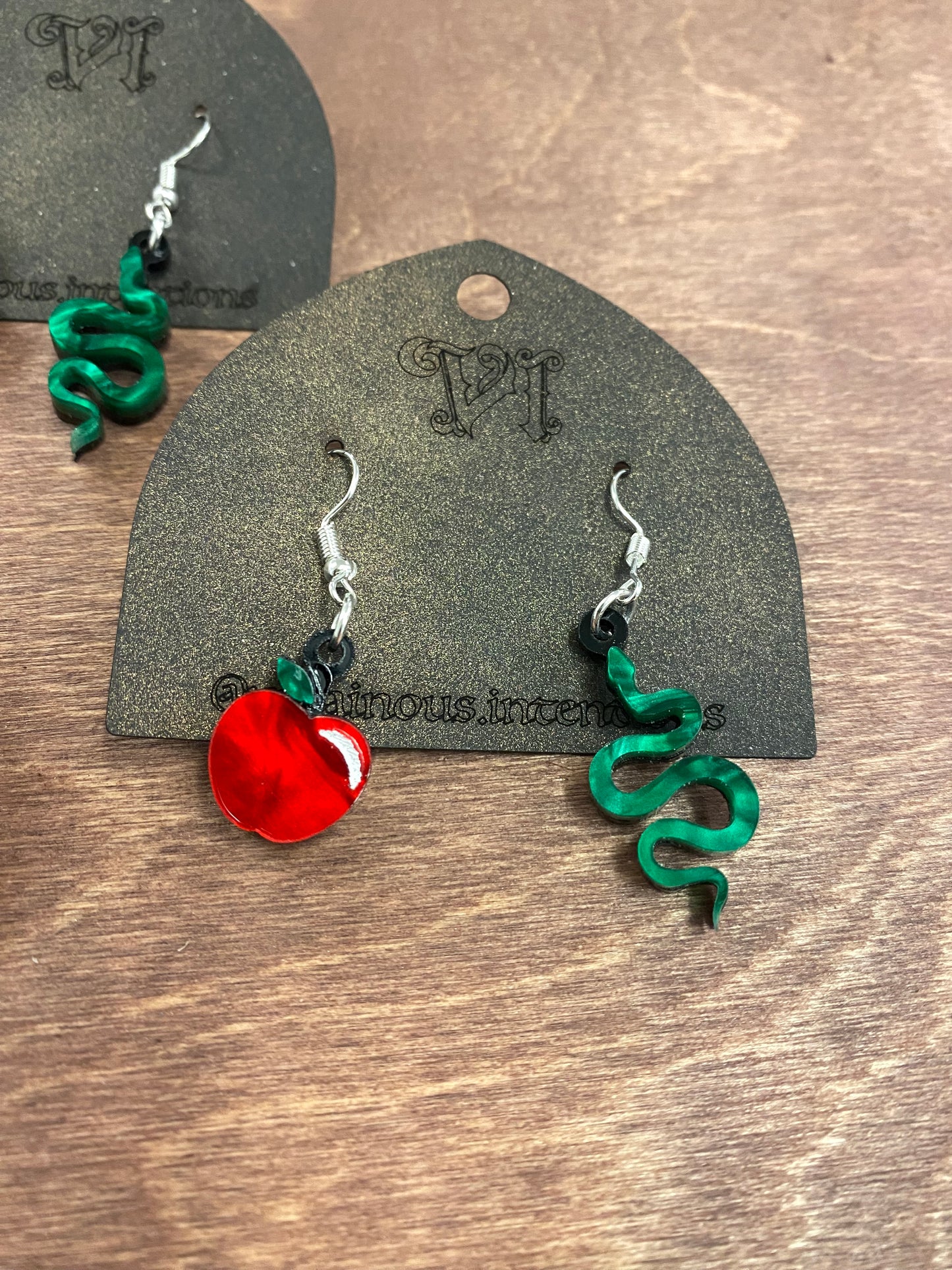 Snake & Apple mismatched earrings