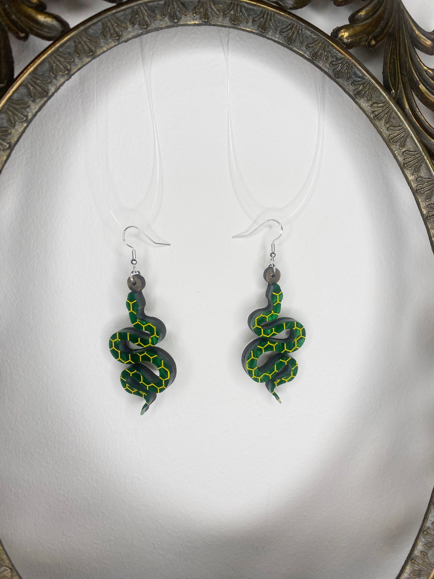 Serpent dangle earrings