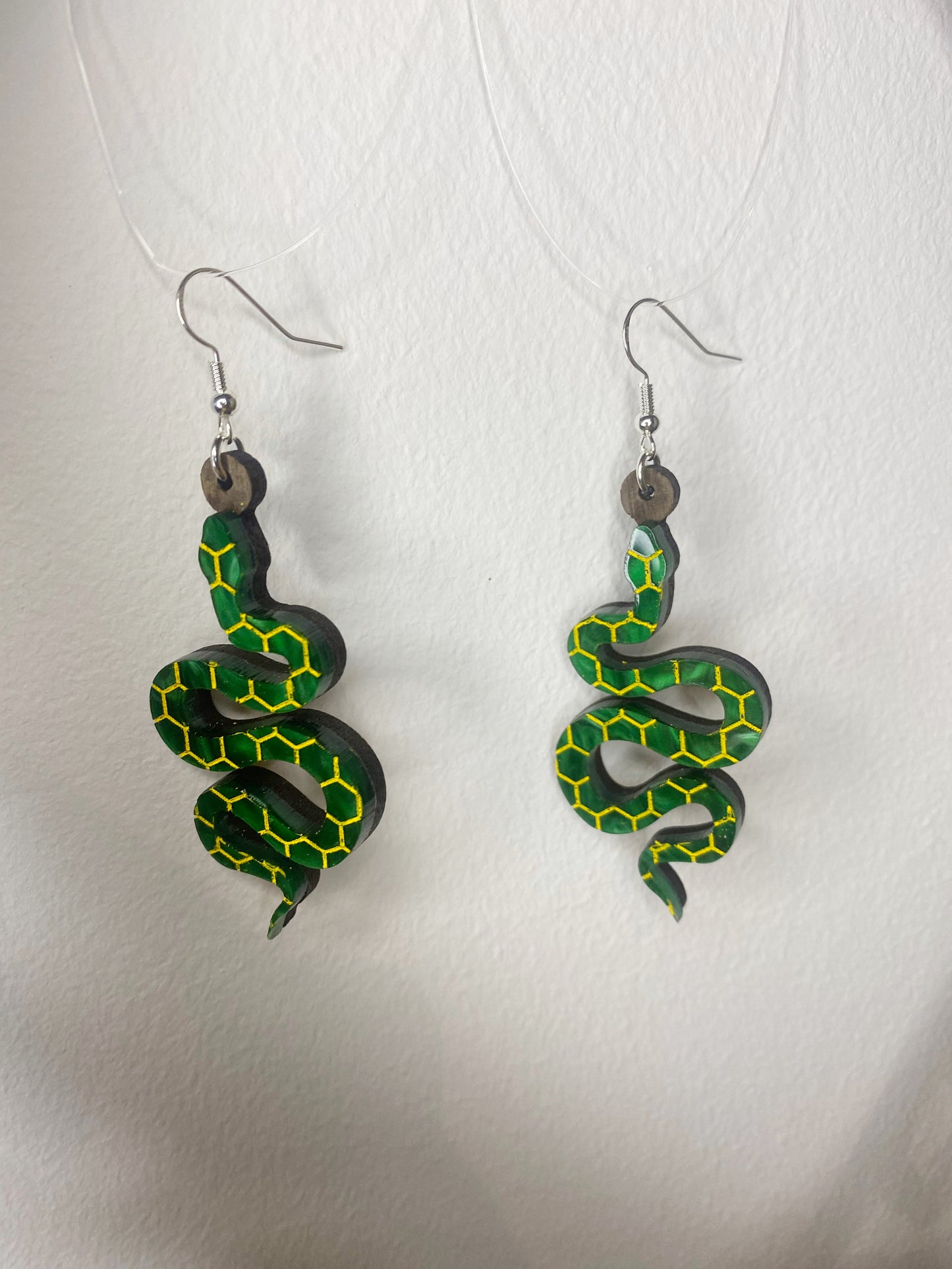 Serpent dangle earrings